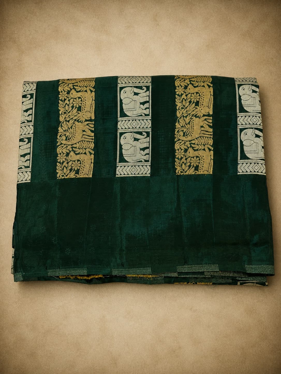 Bottle Green Crepe Saree With Elephant And Deer Motifs in Bottle Green / Gold, Crepe Silk