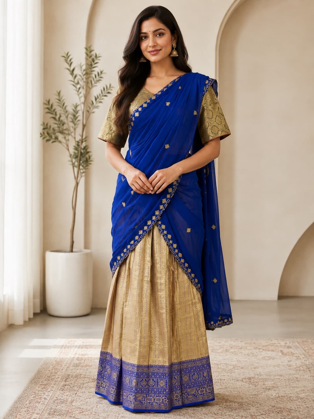Royal Blue & Gold Stunning Ready-To-Wear Half Saree Set In Luxurious Tissue Material, Beautifully Complemented By A Royal Blue Dupatta With Delicate Gold Detailing. A Rich And Elegant Festive Look. in Blue/ Gold